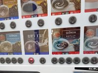 DSC 0593  Vending machine craziness ensued. We wanted a HOT chocolate. Georgia in the middle. See that? Creamy and smooth? 100 yen. Should be easy enough.