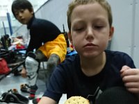 DSC 0594  Feeding Ben between dry land and skating. Here honey, eat this?