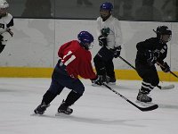 World Girl's Ice Hockey Weekend event 2016 049  This is a great picture from Liz, Tyler's mom (in red 11 jersey). They are from Bremerton. This is the boys on the ice practicing. Sam is in the USA Jersey.